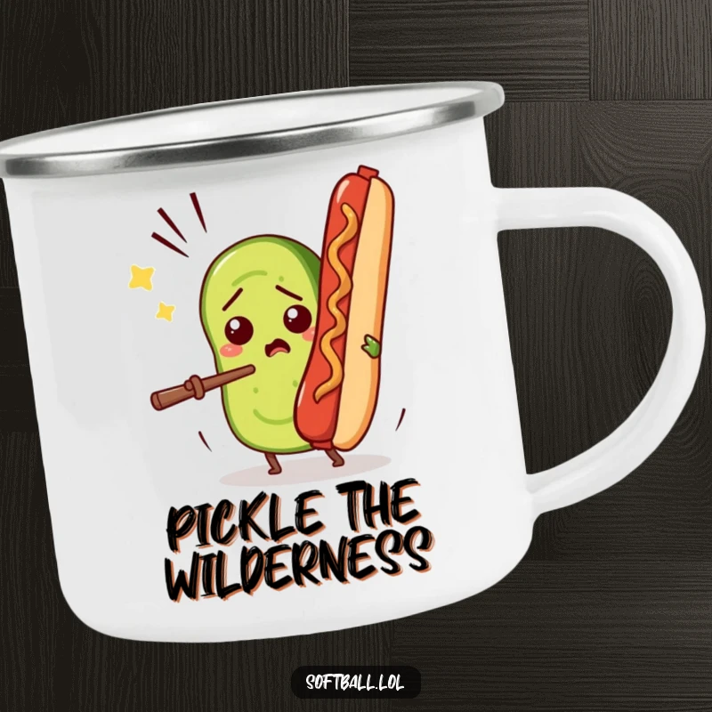 Funny enamel camping mug featuring a confused pickle slice comically batting a flying hot dog, perfect for outdoor adventures.