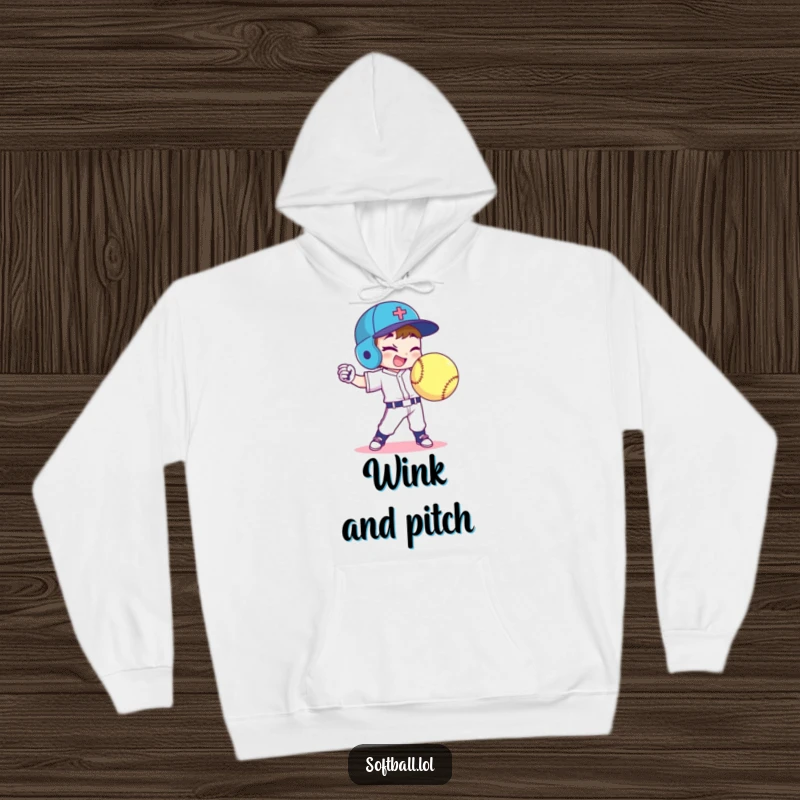 Funny softball player hoodie shows a character throwing a curveball with a signature wink, combining warmth and humor.