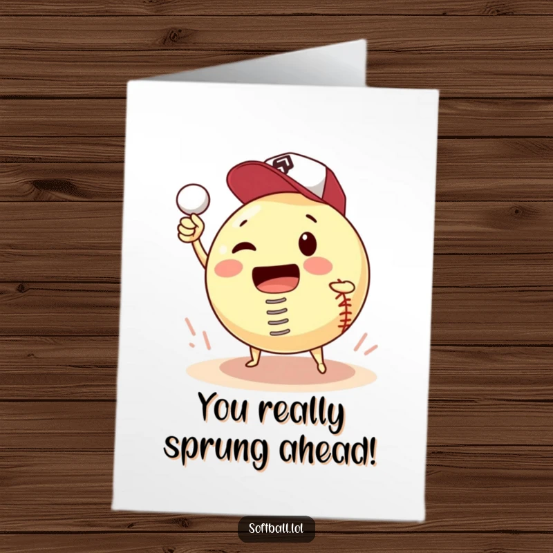 Funny Free Printable Congratulations Card showing a softball on a spring, comically attempting to pitch itself to celebrate success.