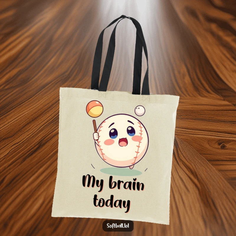 Funny softball tote bag with a surprised expression, depicted catching a pop fly, excellent for a funny gift.