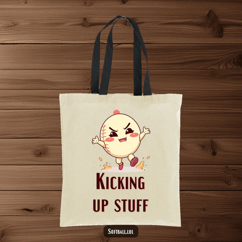 Funny softball tote bag showing a character playfully kicking up dust with a determined, happy grimace, great for carrying essentials.